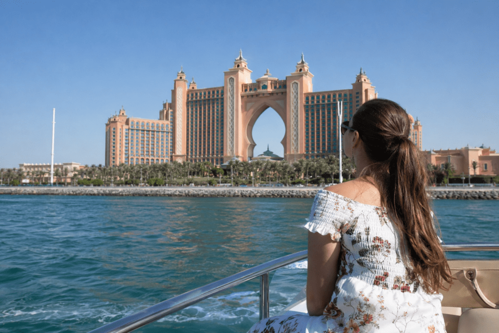 Luxury yacht cruise near Atlantis The Palm with breathtaking sea views and iconic landmarks, one of the top things to do in Palm Jumeirah Dubai. | GoDubaiNow