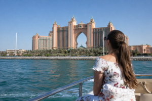 Luxury yacht cruise near Atlantis The Palm with breathtaking sea views and iconic landmarks, one of the top things to do in Palm Jumeirah Dubai. | GoDubaiNow