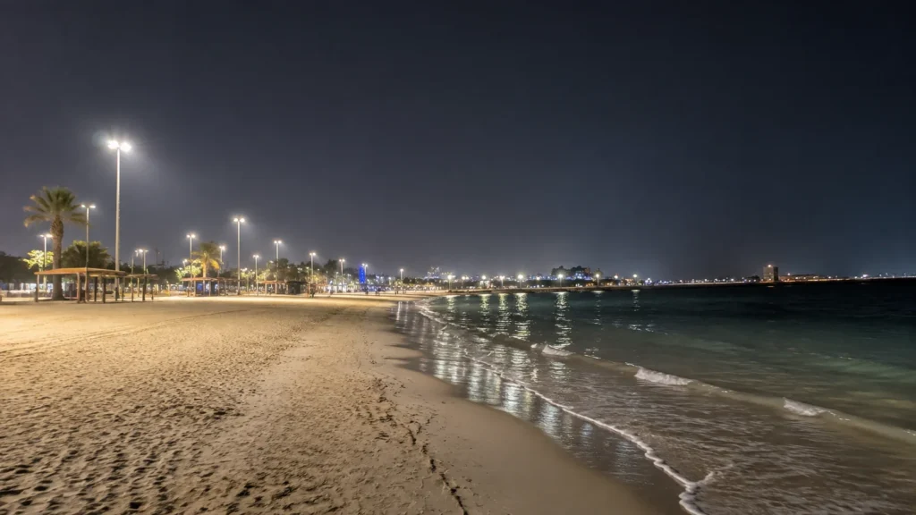 Dubai night beach at Jumeirah 2 with illuminated sand and shoreline