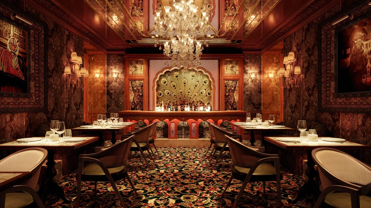 Gymkhana Dubai dining room with chandelier, tiger artwork and peacock bar, one of the new restaurants in Dubai