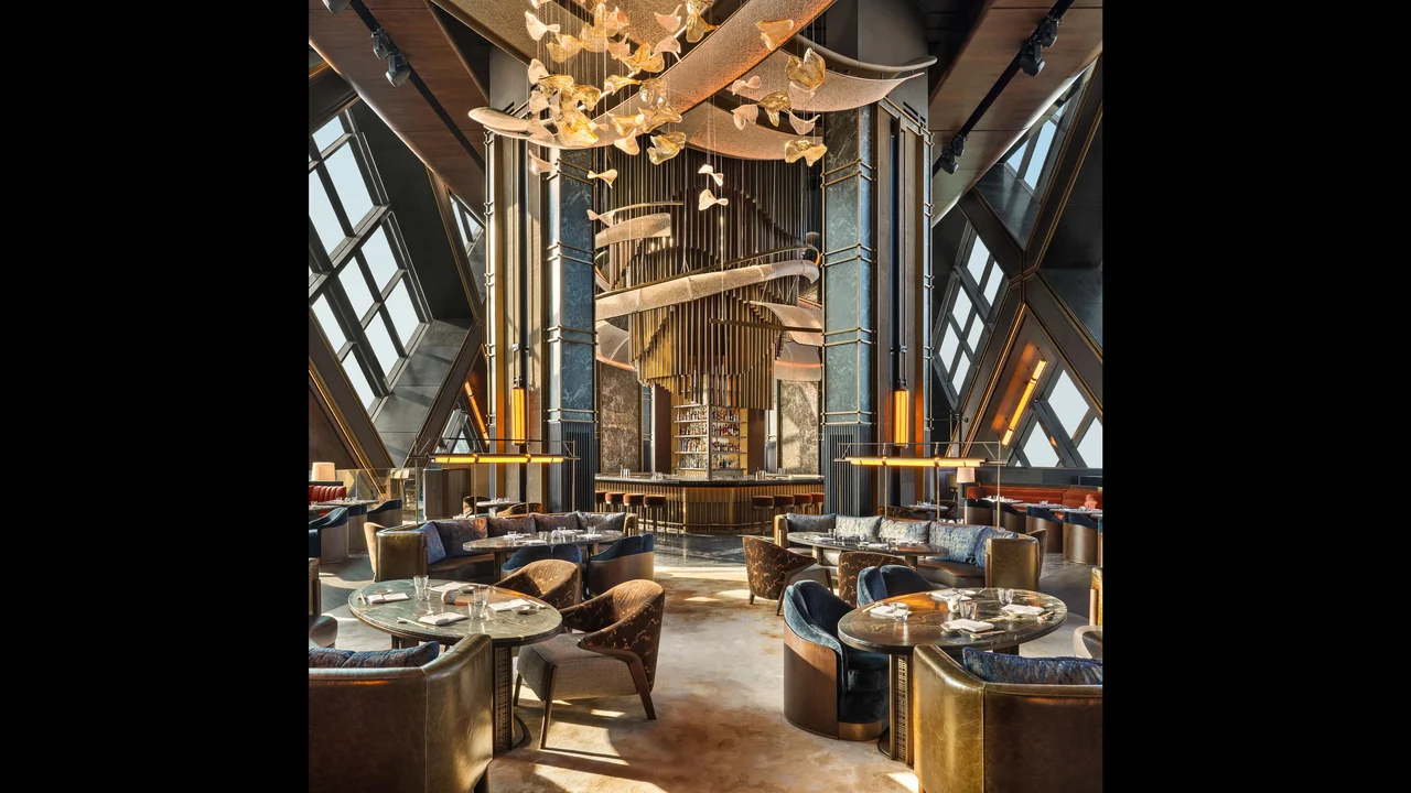 Main dining room of Nobu One Za'abeel with sculptural lighting and skyline windows, among the new restaurants in Dubai for 2026
