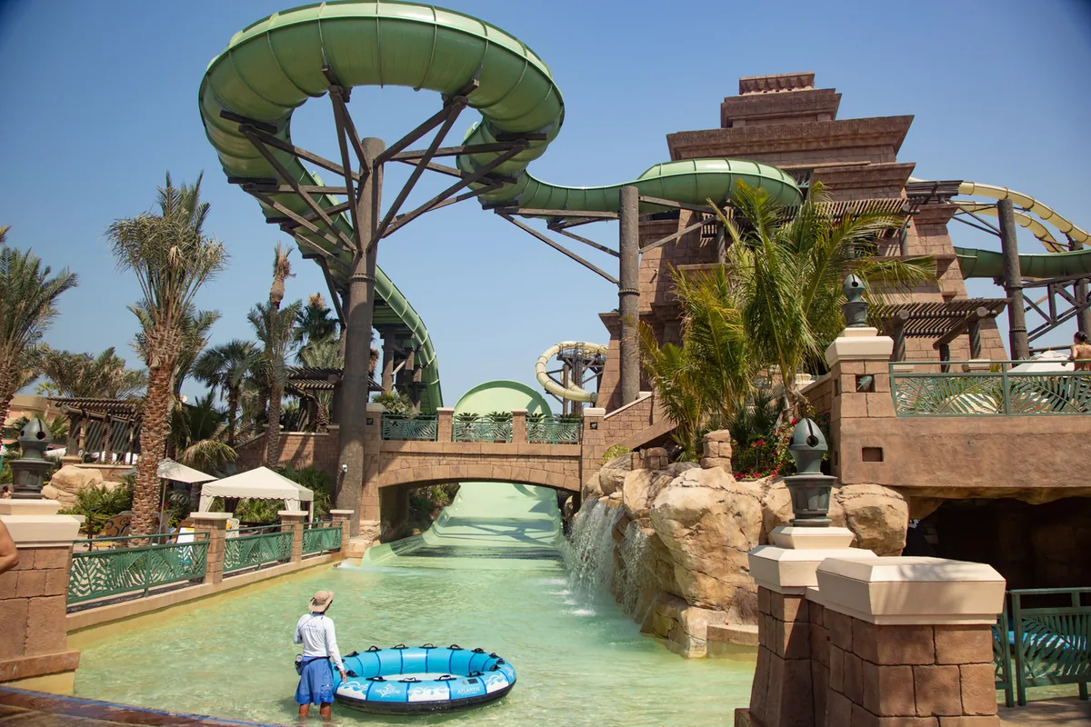 A waterslide emptying into a pool at Aquaventure Waterpark
