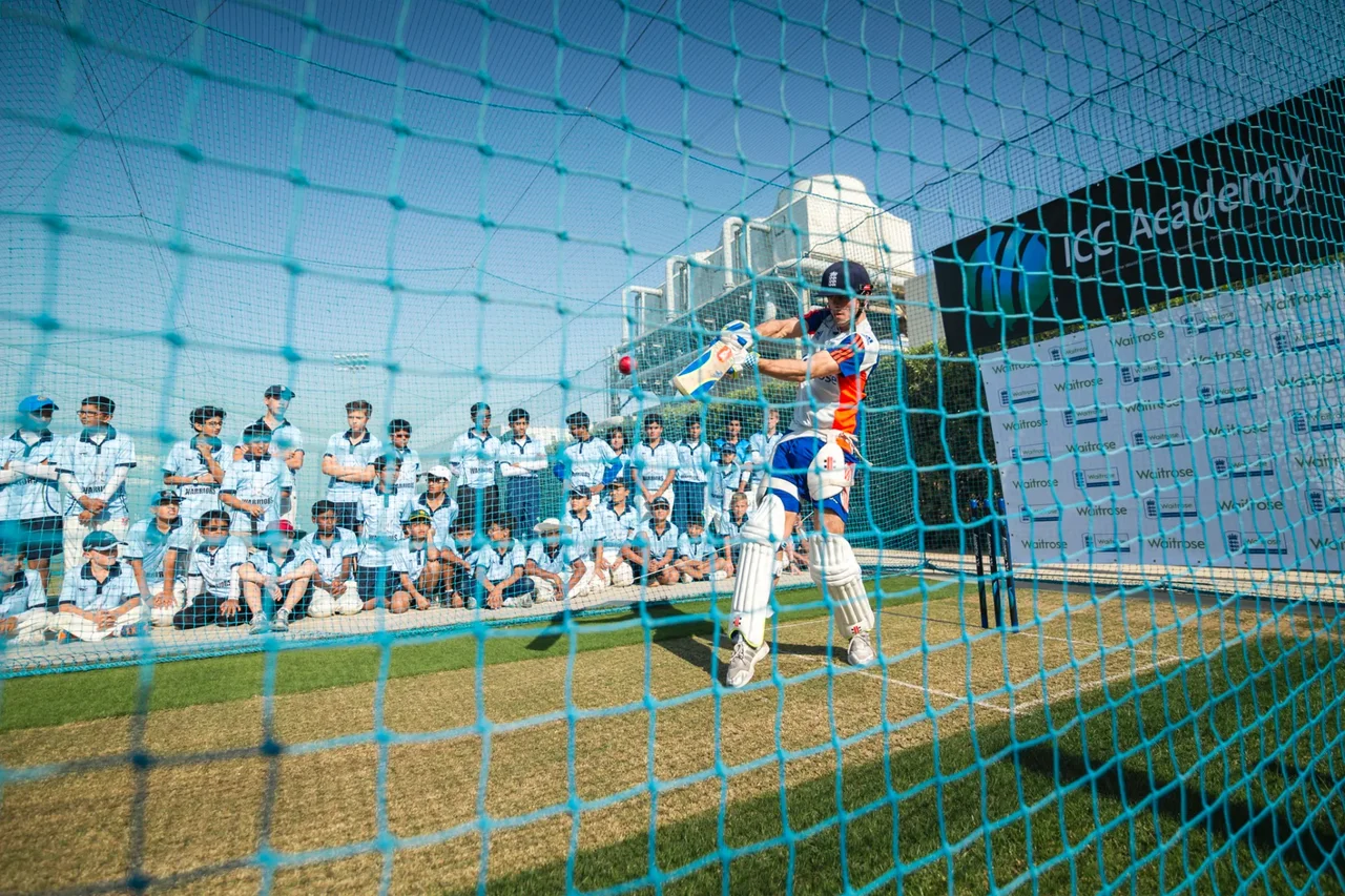 A cricket coaching session at the outdoor nets of the ICC Academy in Dubai Sports City