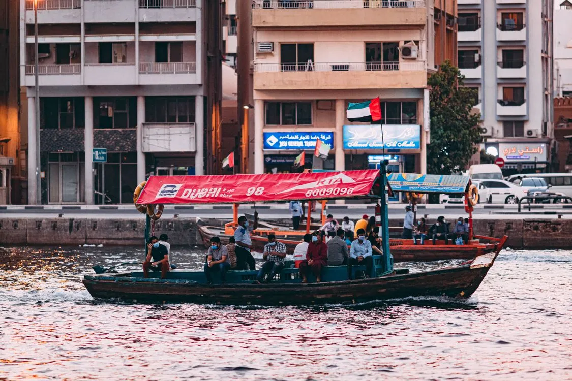 Passengers aboard an RTA abra crossing Dubai Creek, the cheapest ride in the city