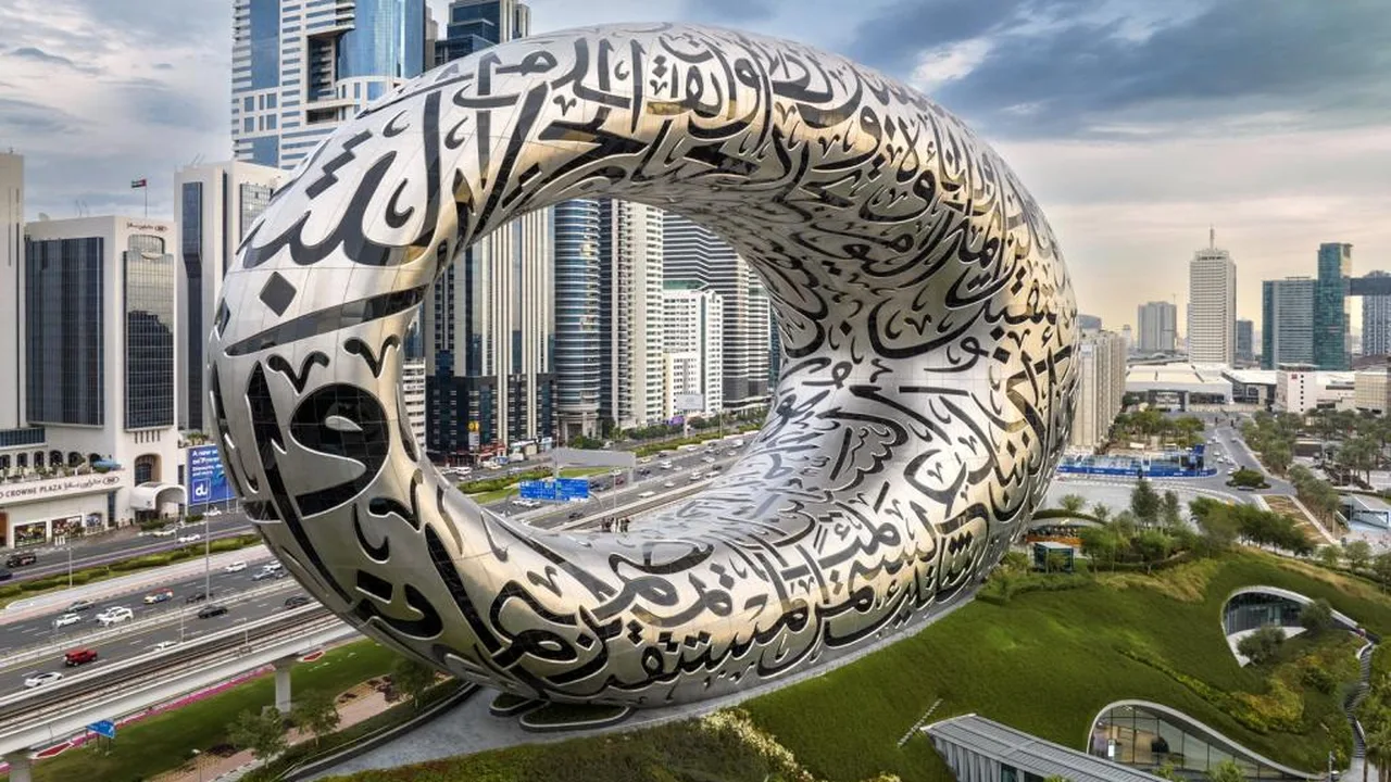 The Museum of the Future beside Sheikh Zayed Road, seen from above with Dubai's skyline around it.
